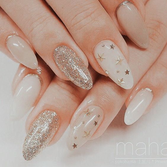 Sparkly Accent with Milky White Nails and Gold Stars