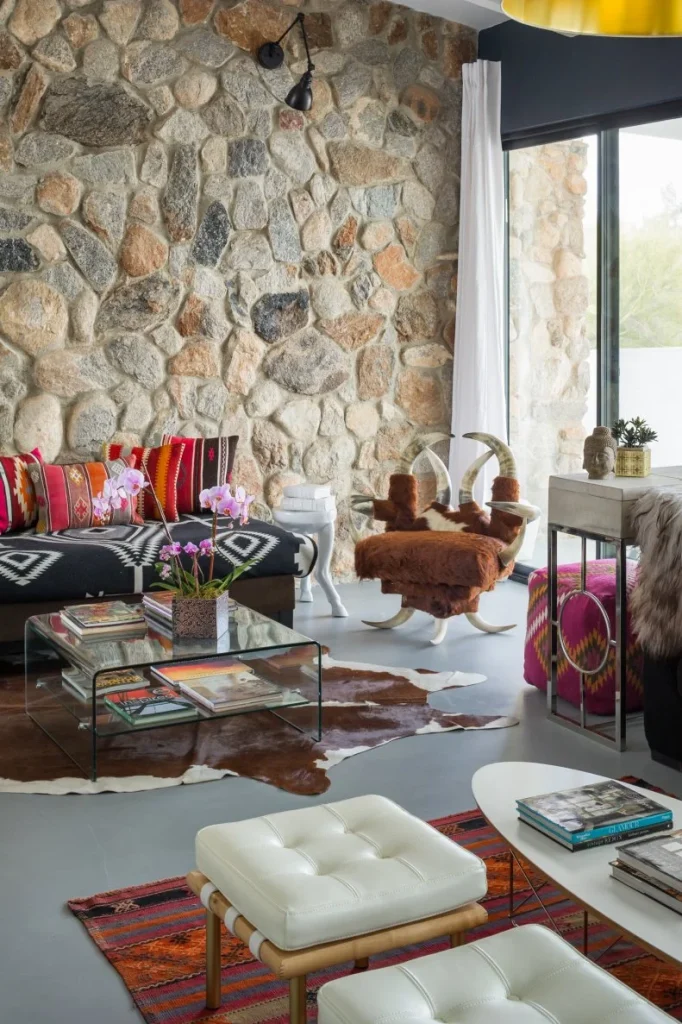 Stone Wall Adds Color and Texture to Eclectic Living Room