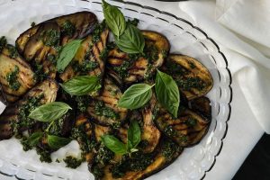 Smoky, tender eggplant draped in a zesty salsa verde