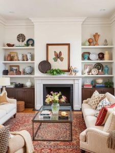 Maximalism thrives on collections—whether it’s vintage porcelain, antique figurines, or a display of unique ceramics. Instead of hiding collectibles in cabinets, proudly showcase them on open shelving, mantels, or coffee tables. Group similar items together for a cohesive look while still embracing the eclectic spirit. The key is to make collections feel intentional rather than cluttered—arrange them in varying heights and layer them with books or framed artwork for a curated effect.