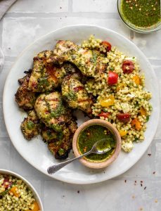 GRILLED CHIMICHURRI CHICKEN WITH COUSCOUS SALAD.