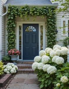 Painting your front door a striking color and making it part of your landscaping creates a styled, designer look. Navy doors with white hydrangeas, coral doors with greenery. Instant curb appeal increase!